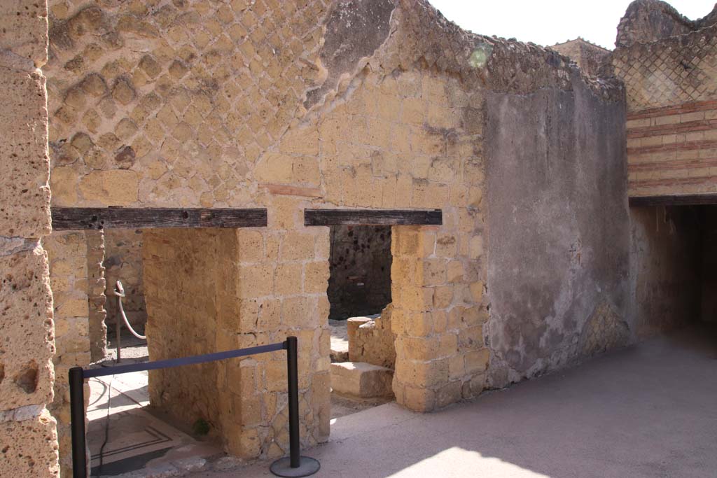 III.3 Herculaneum. September 2019. Looking towards doorways on north side of atrium.
Photo courtesy of Klaus Heese.